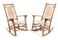 A Pair of Rustic Style Rocking Chairs Height 45 inches.