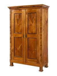 A Biedermeier Parcel Ebonized Birch Armoire