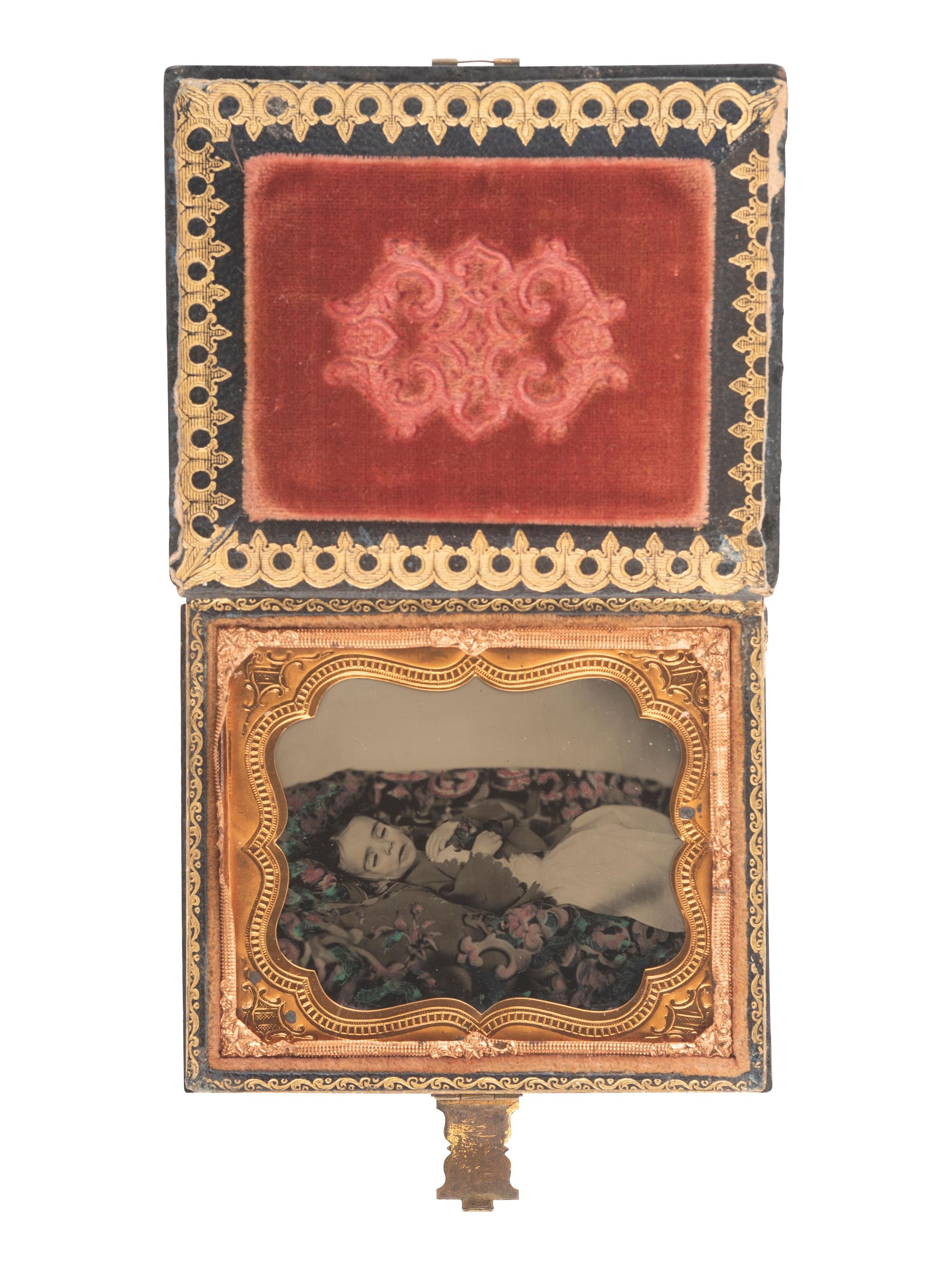 [EARLY PHOTOG] Sixth plate postmortem ambrotype of a young girl housed in "memorial" case.