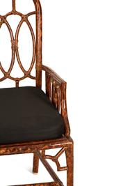 A Faux Tortoise Shell Painted Bamboo Armchair