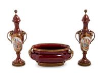 An Assembled French Gilt Metal Mounted Porcelain and Pottery Garniture