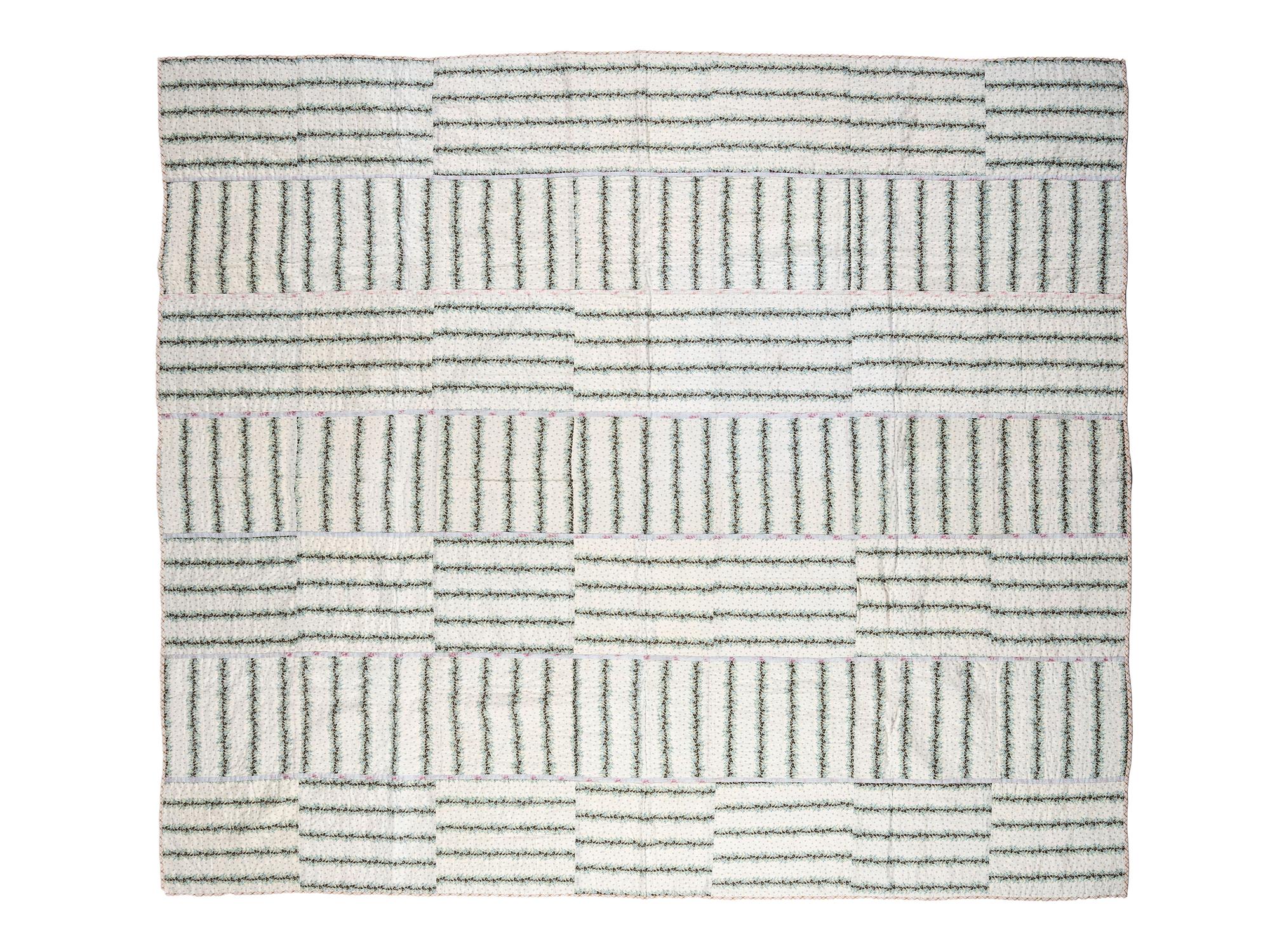 Three Patchwork Quilts