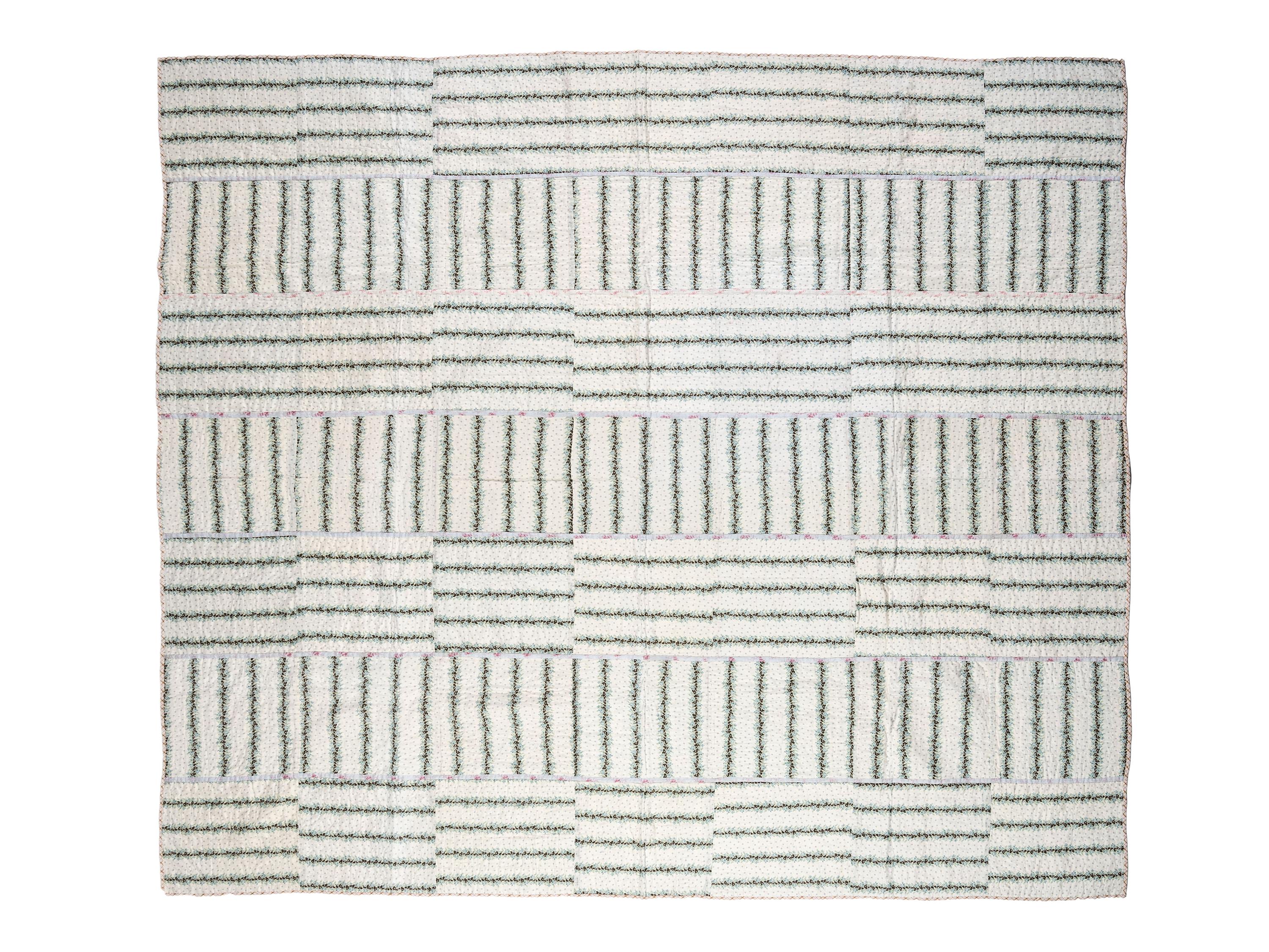 Three Patchwork Quilts