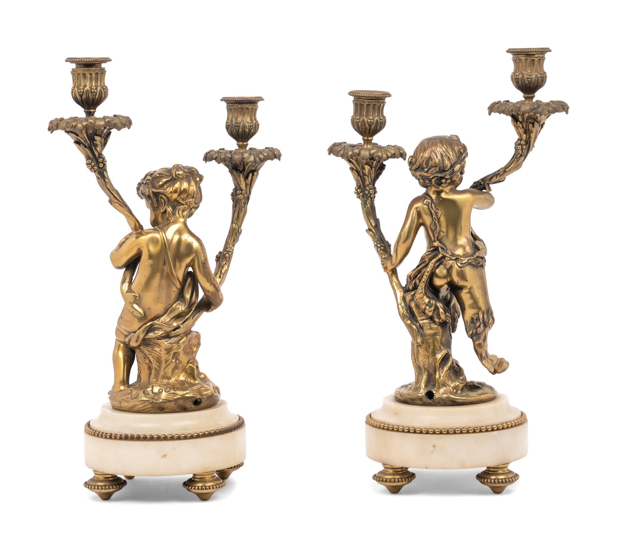 A Pair of French Gilt Bronze and Marble Figural Two-Light Candelabra