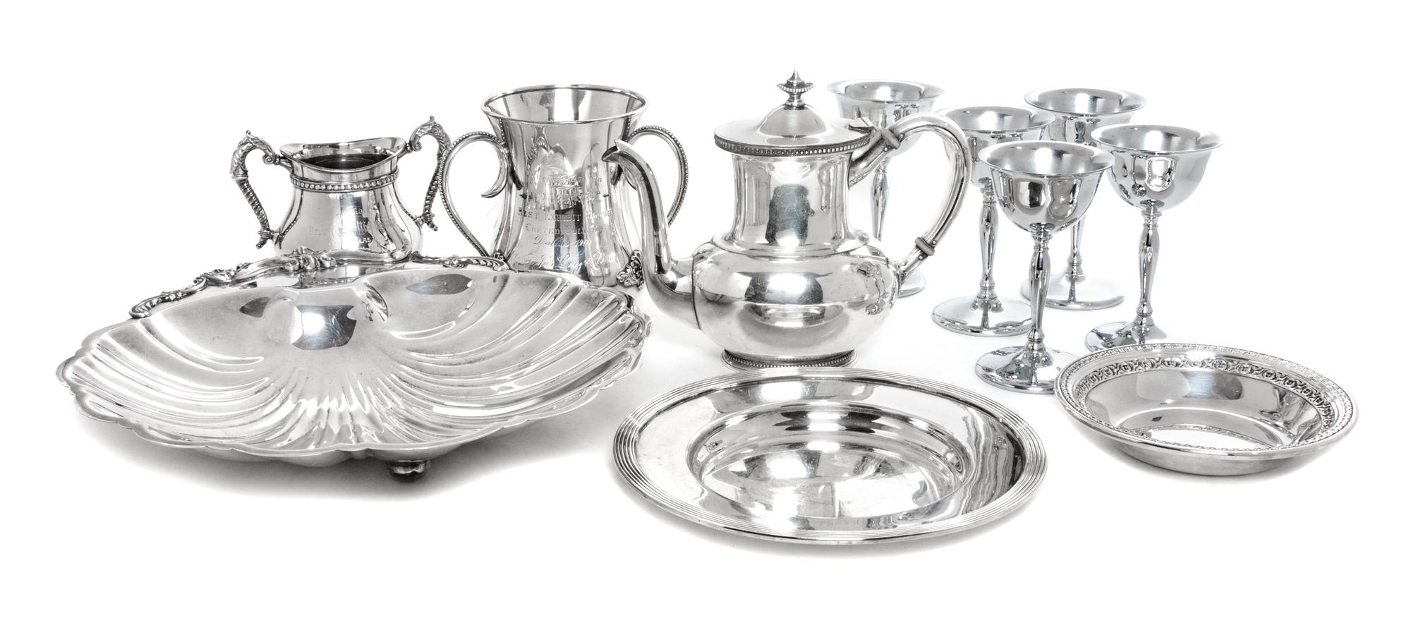 Eleven Silverplate Articles related to Coated Collies Width of widest 12 1/2 inches.