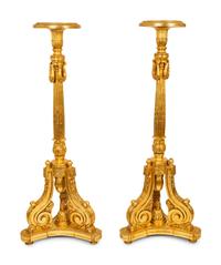 A Pair of Louis XVI Style Giltwood Torcheres — 20TH CENTURY