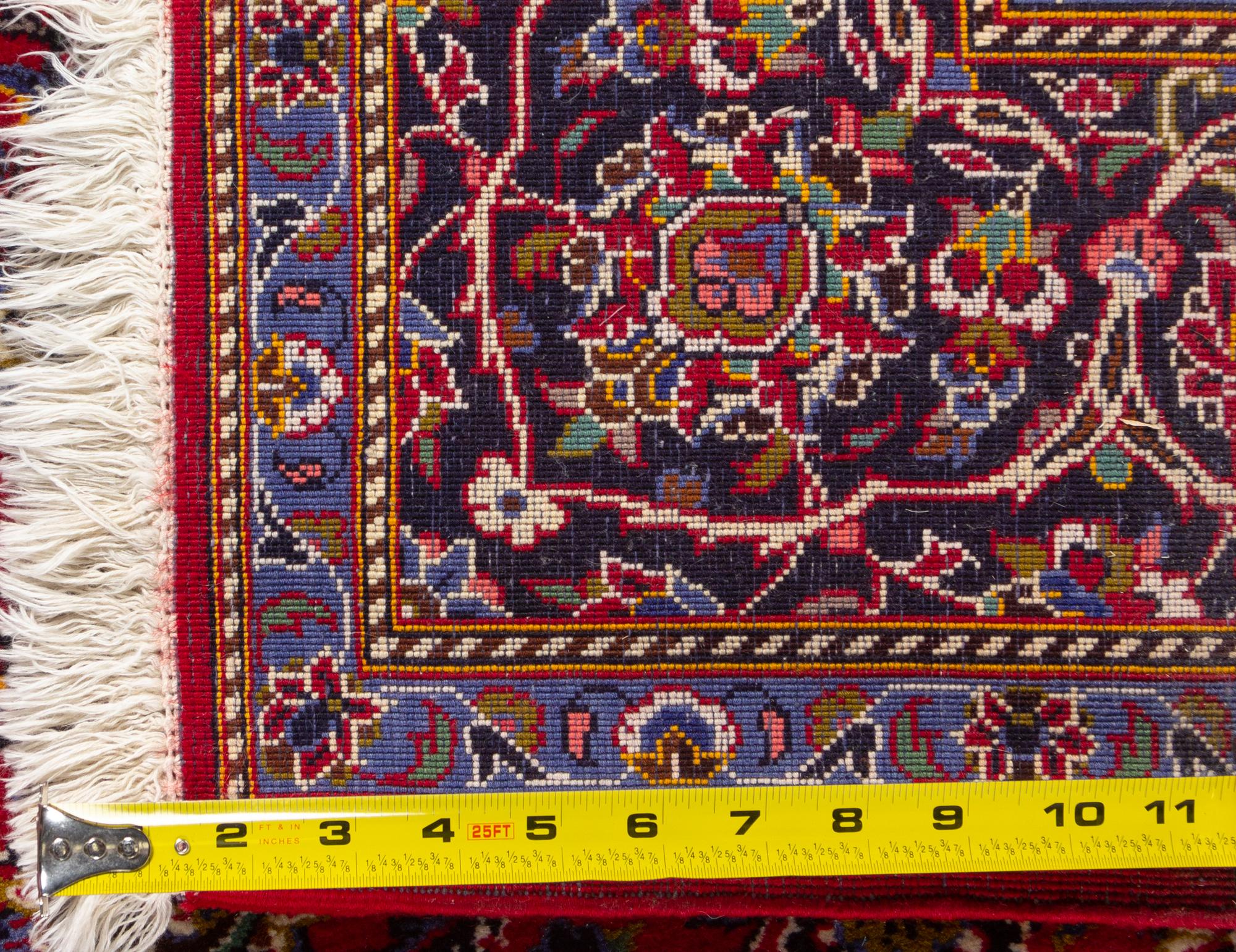 A Kashan Wool Rug