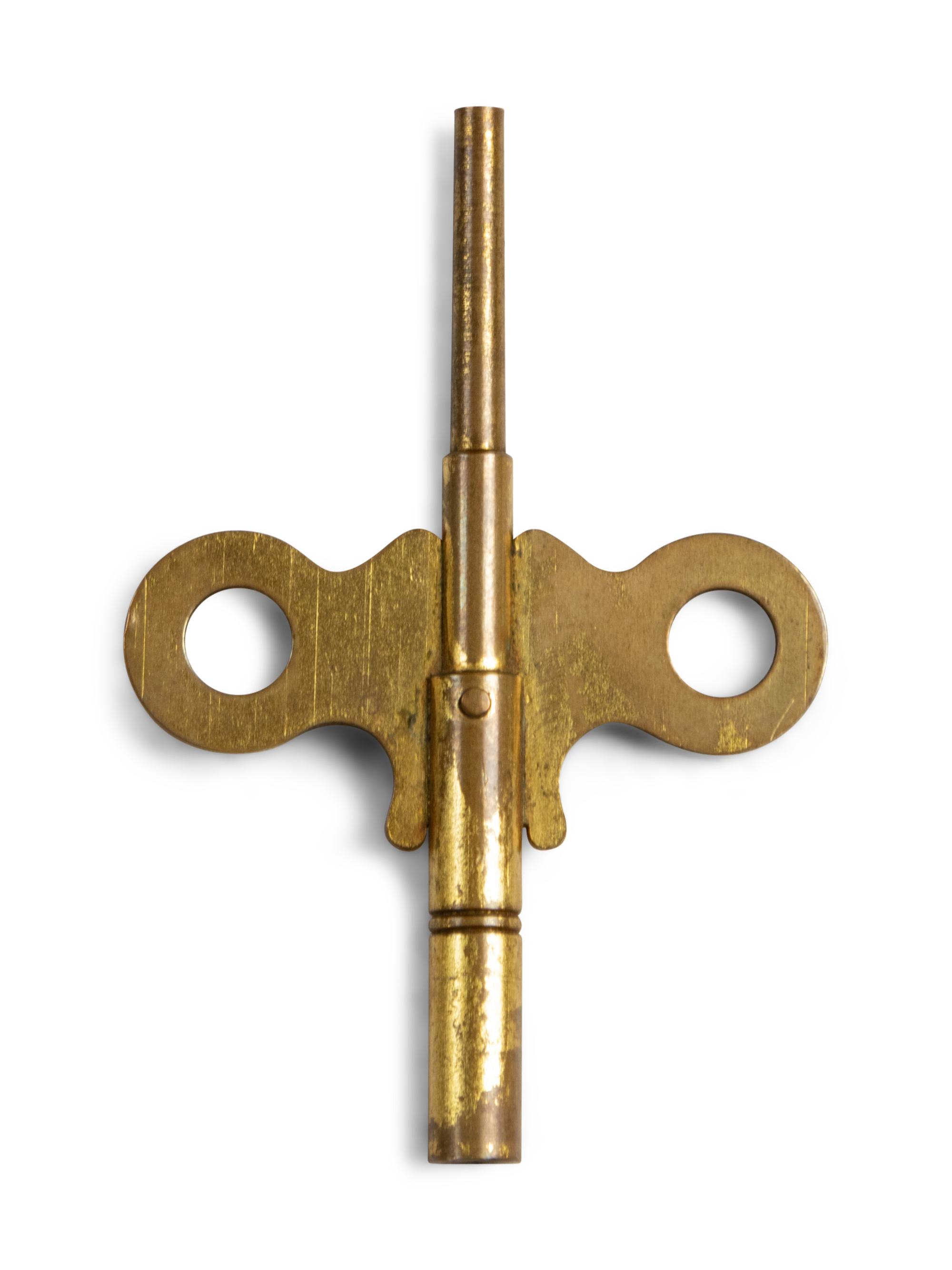 A French Gilt and Patinated Bronze and Marble Mantel Clock