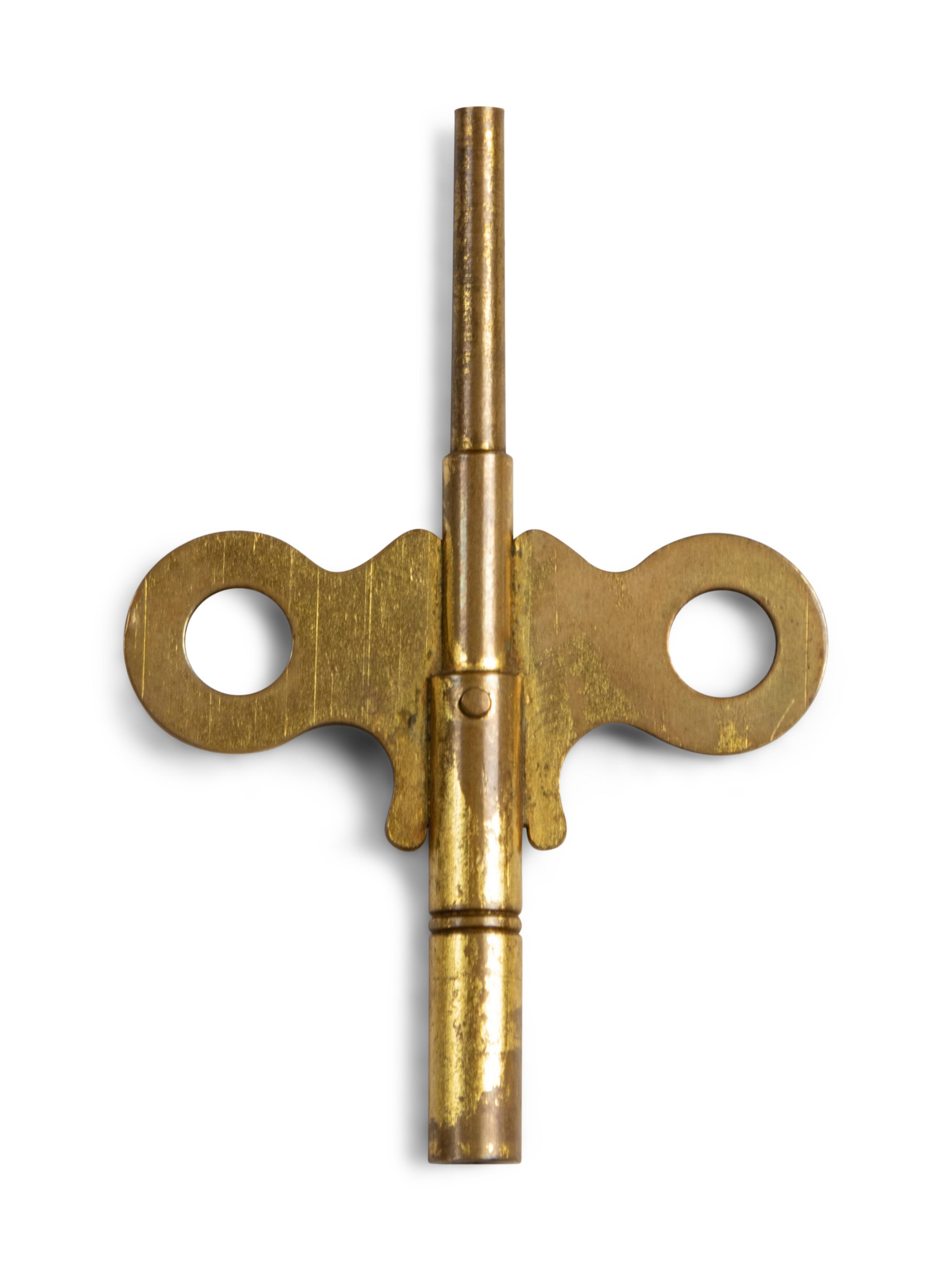 A French Gilt and Patinated Bronze and Marble Mantel Clock