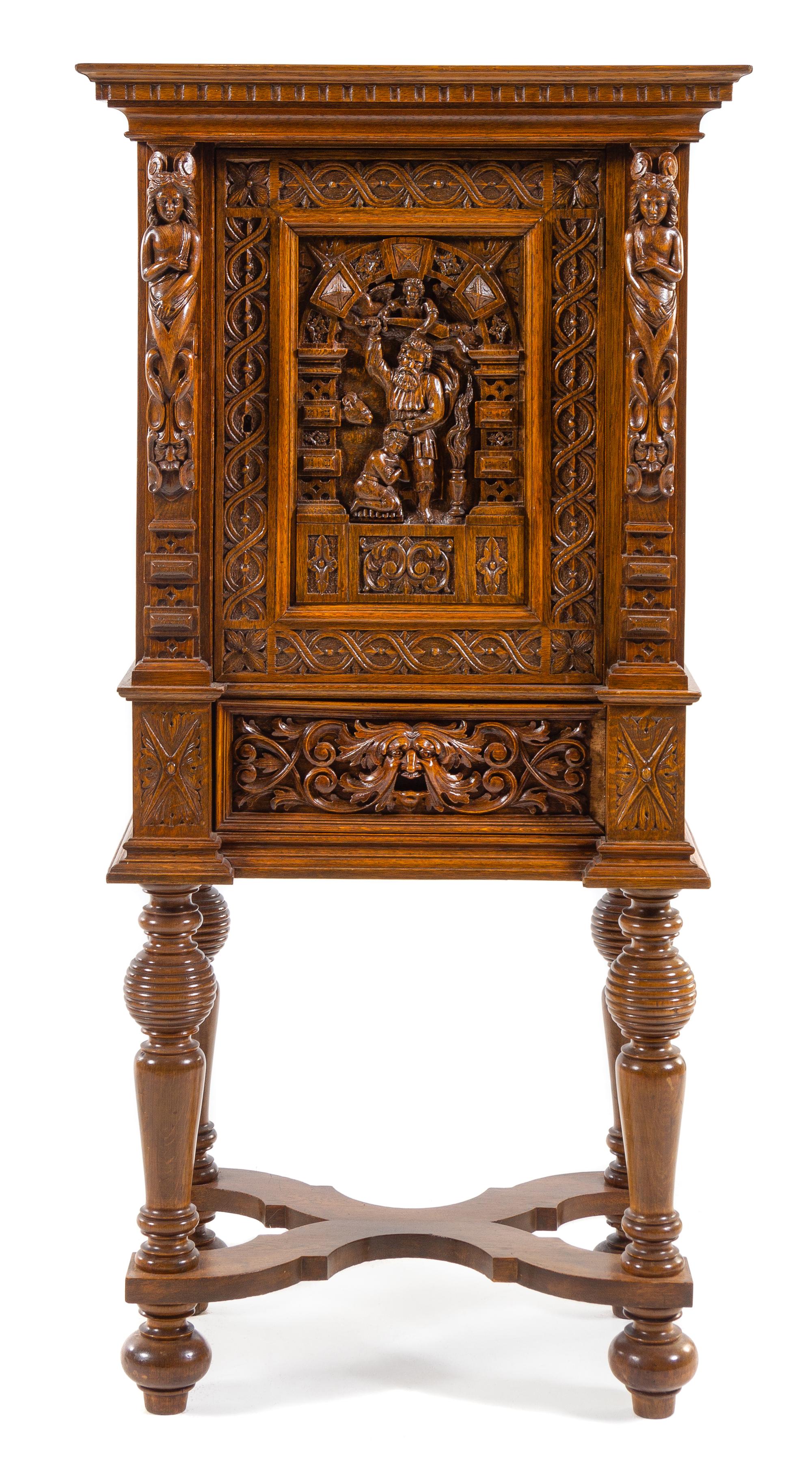 A Dutch Carved Oak Cabinet Height 56 inches. — 19TH CENTURY