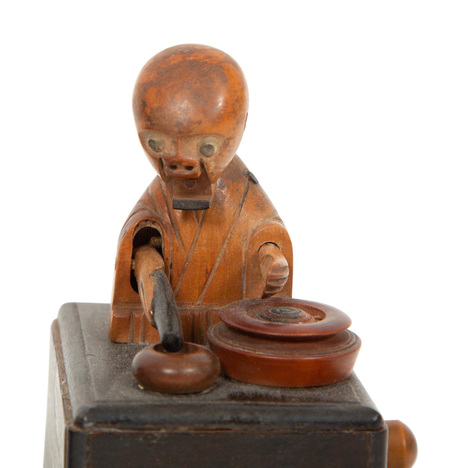 Two Japanese Carved Wood Kobi Ningyo Automatons and a Silver Mounted Gourd