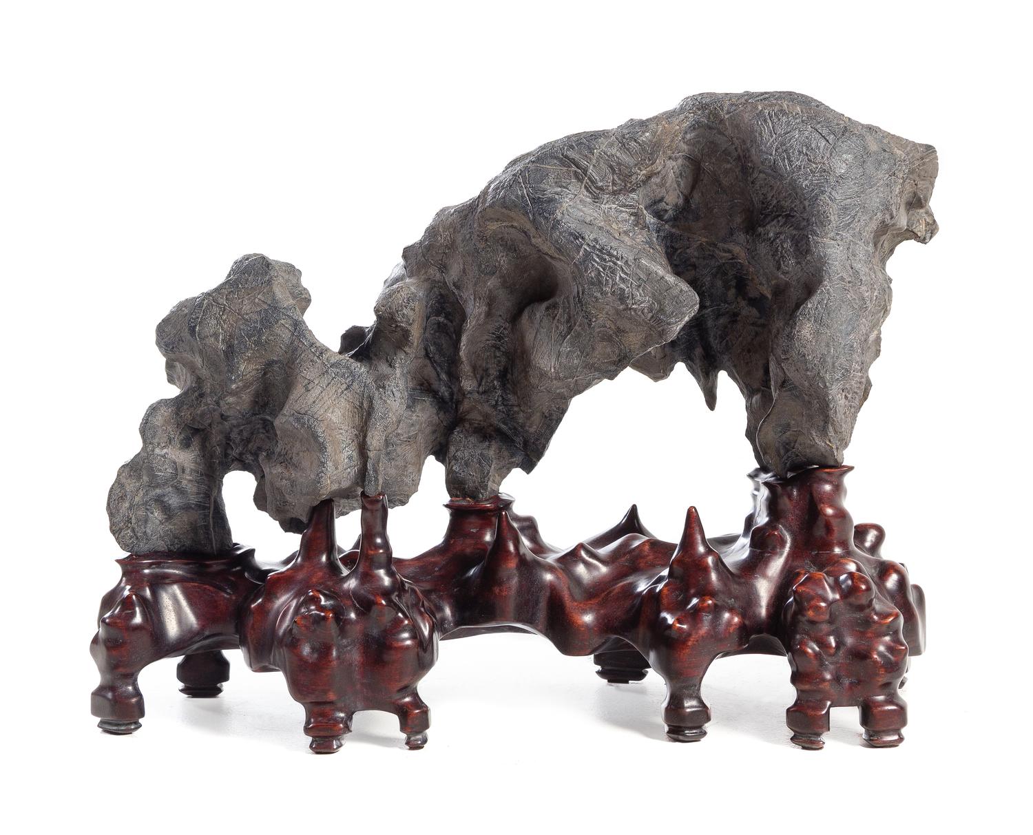 A Chinese Lingbi Scholar's Rock Width of scholar's rock 28 inches.