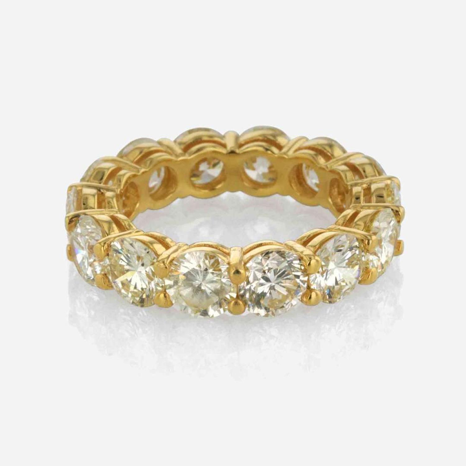 A Diamond and 18K Yellow Gold Ring