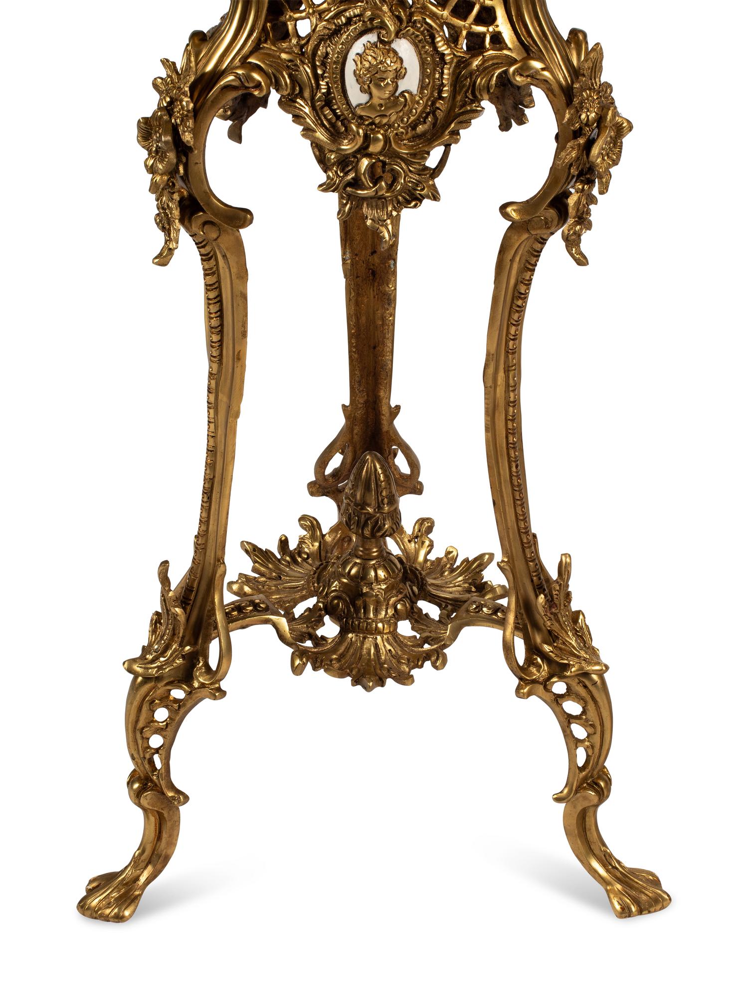 A Pair of Blanc de Chine Porcelain Jars on Gilt Bronze Stands