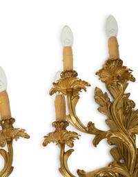 A Pair of Louis XV Style Gilt Bronze Five-Light Sconces — 19TH/20TH CENTURY