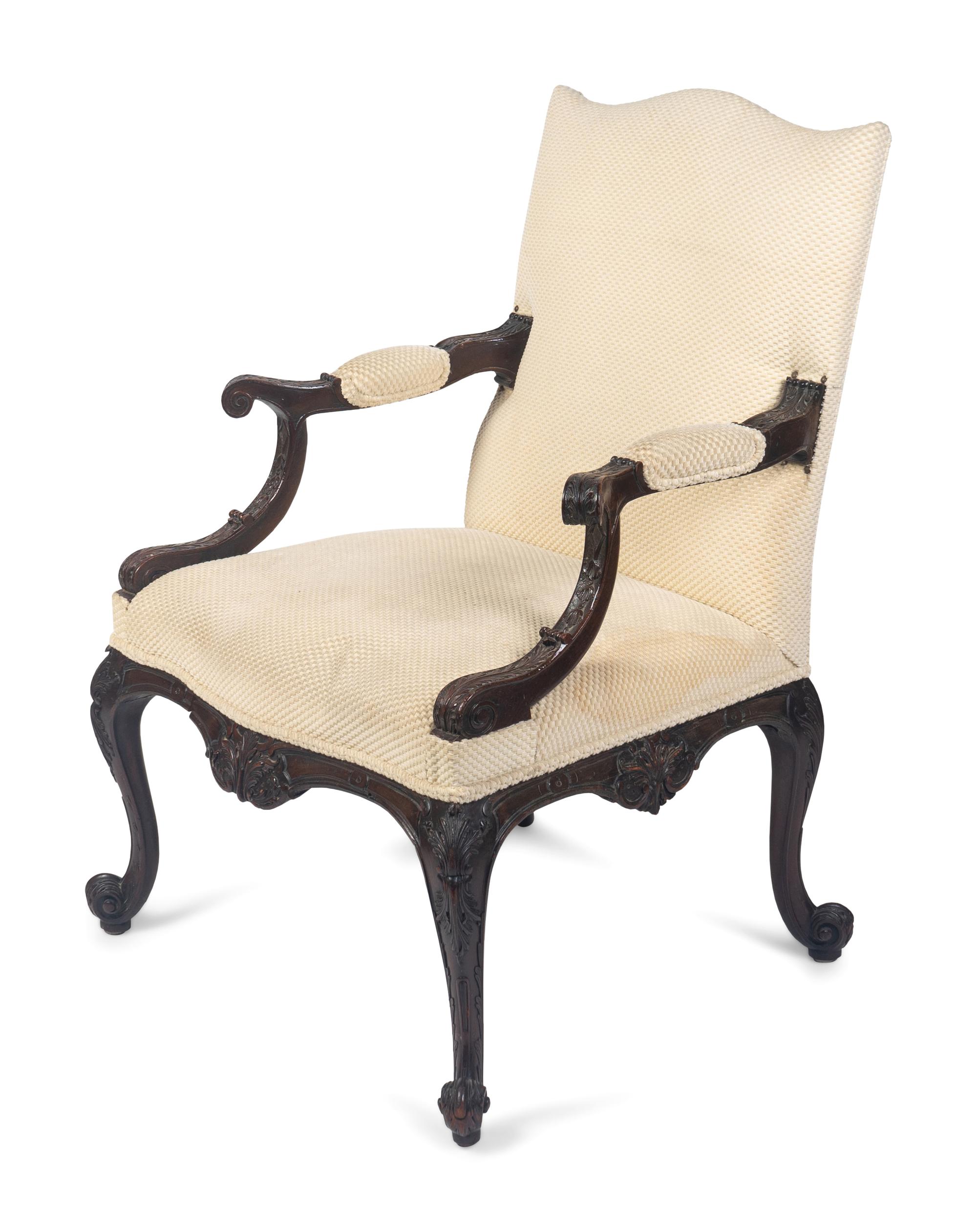 A George III Style Carved Mahogany Library Armchair — 19TH/20TH CENTURY