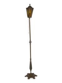 A Pair of Patinated Metal Lantern Style Floor Lamps
