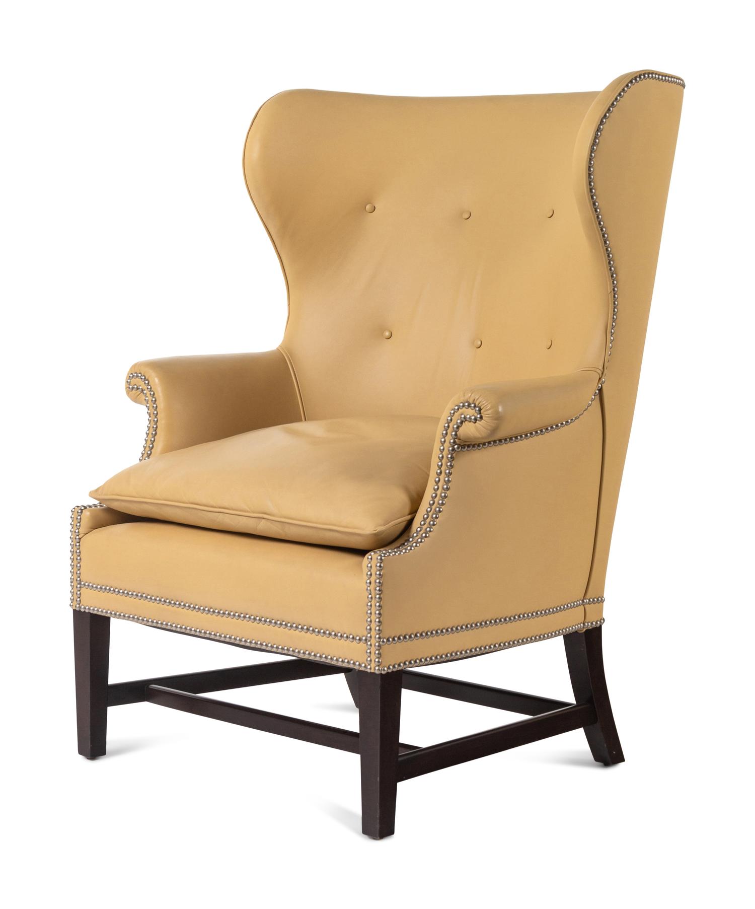 A Pair of Victoria Hagan Leather-Upholstered Wingback Armchairs