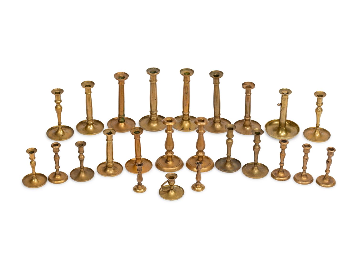 Twenty-Four English Brass Candlesticks