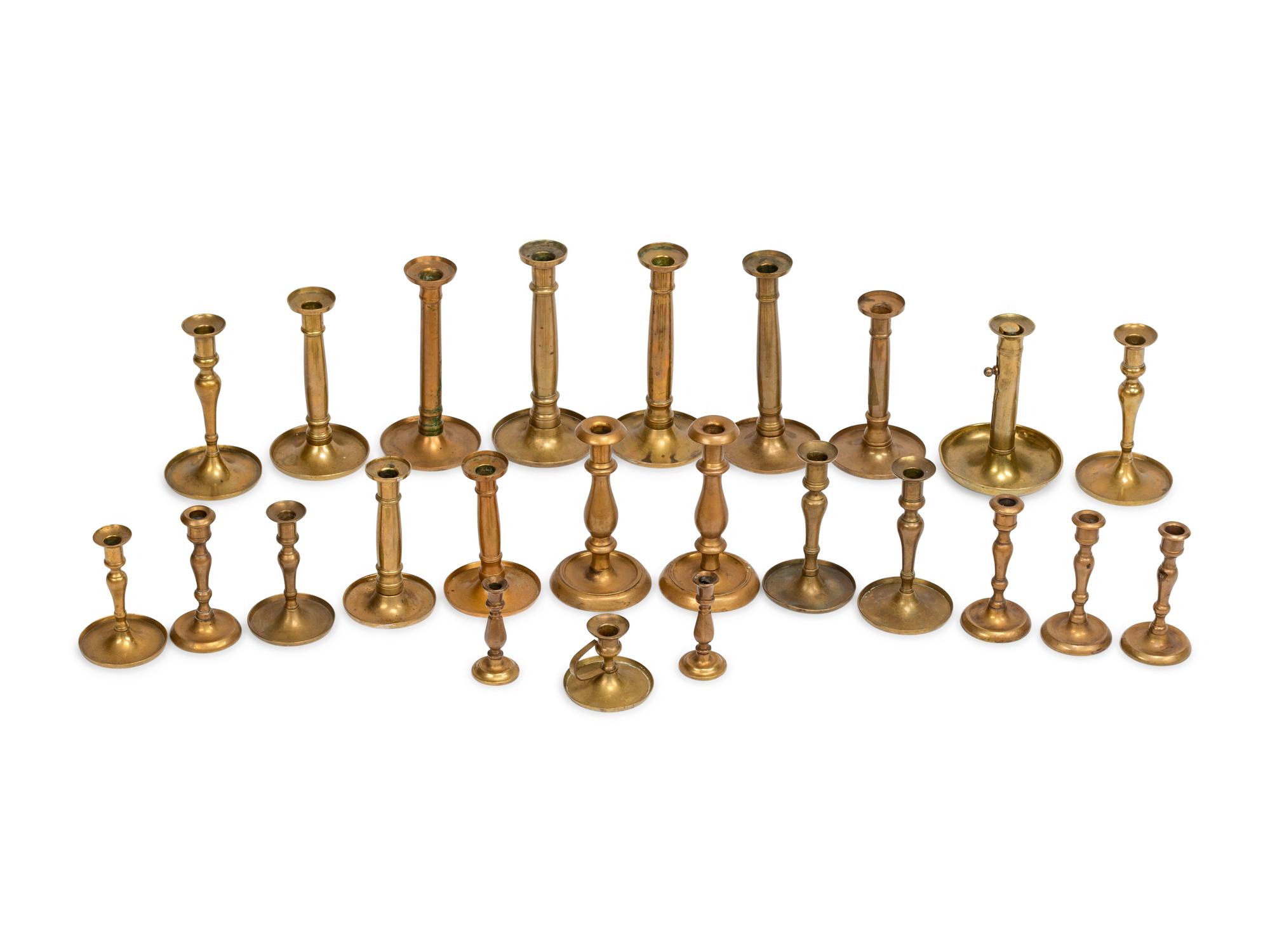Twenty-Four English Brass Candlesticks