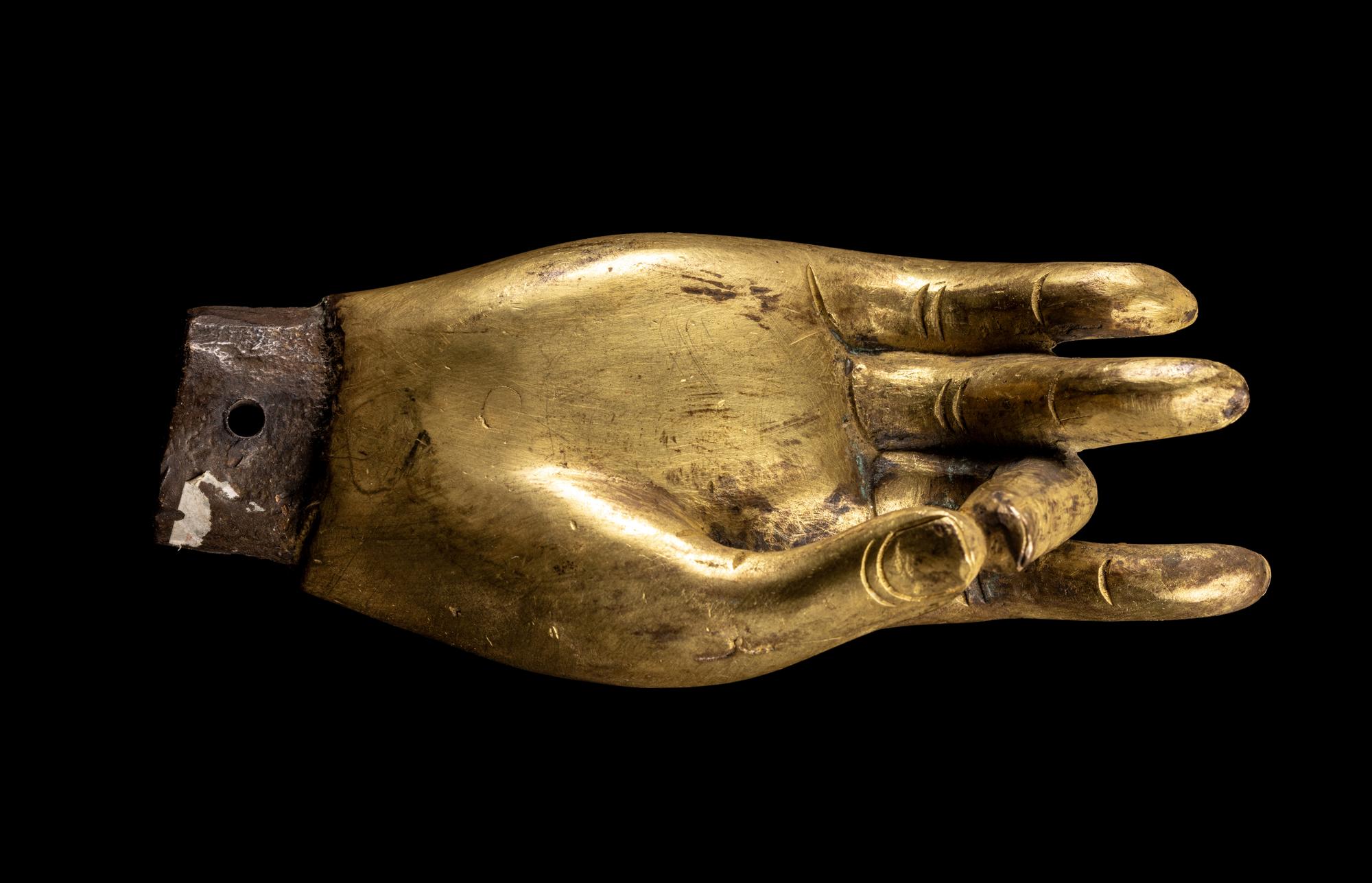 A Chinese Gilt Bronze Hand of Buddha
