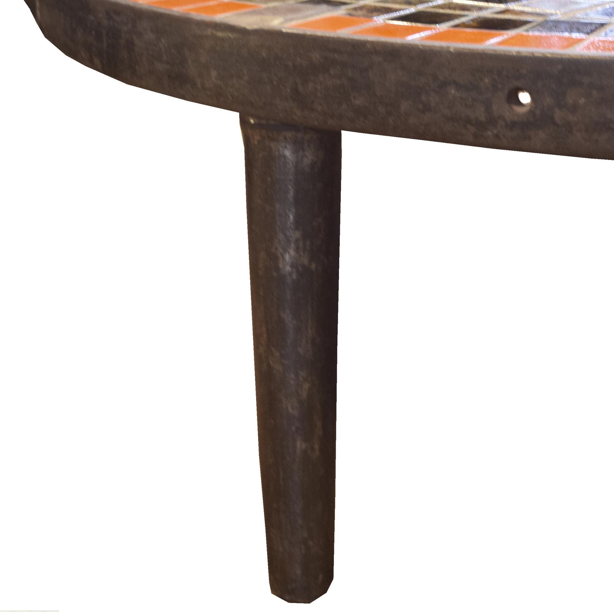 A Mid-Century Iron and Tile Coffee Table 61" W x 61" D x 17.5" H 17.5" H — France, Mid-20th Century