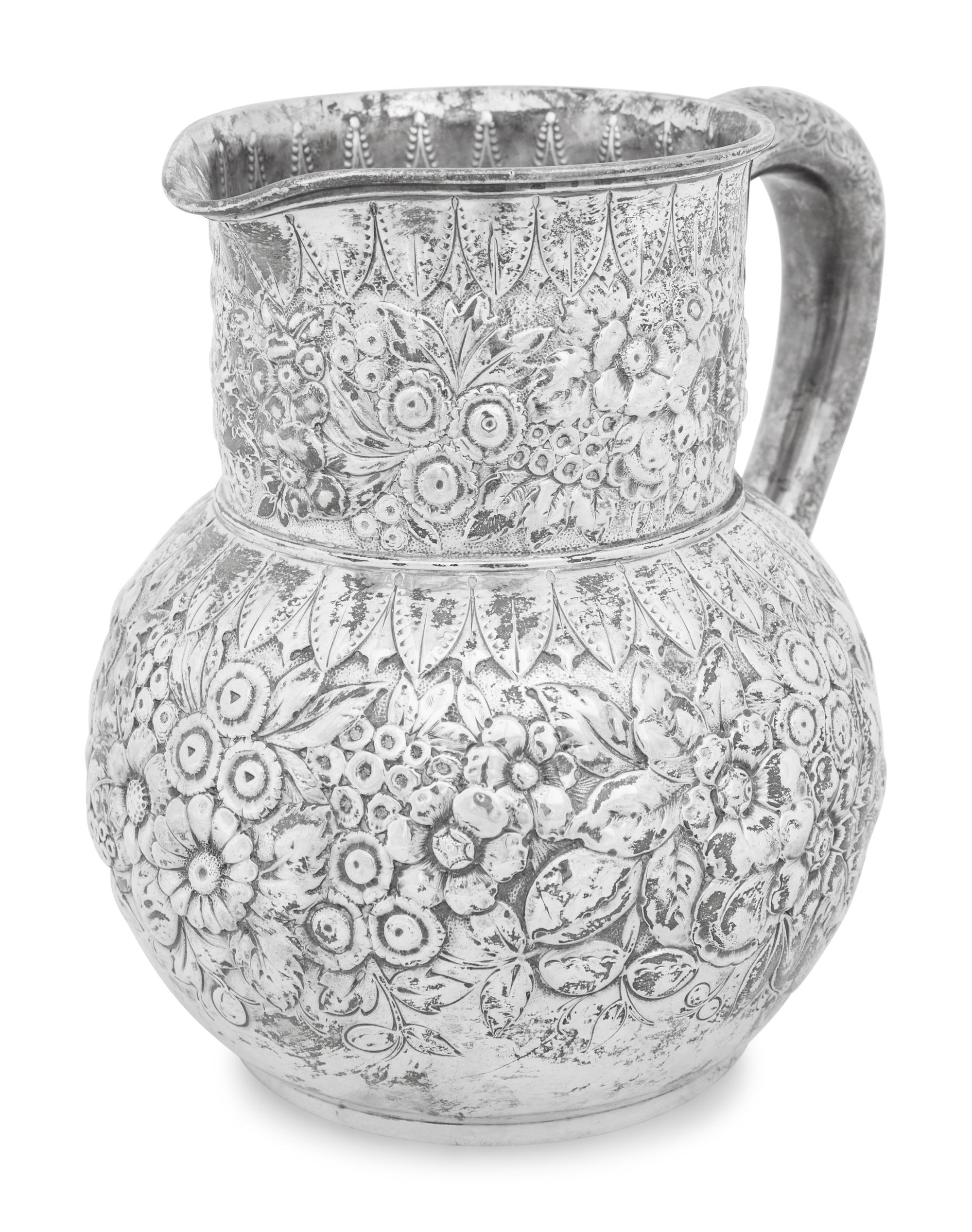 A Tiffany and Co. Silver Repousse Water Pitcher