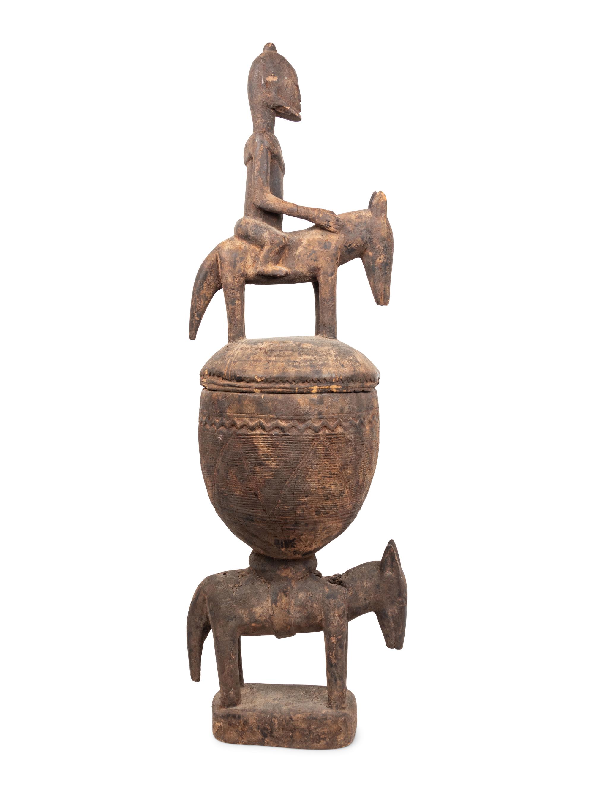 A Dogon Carved Figural Offering Bowl