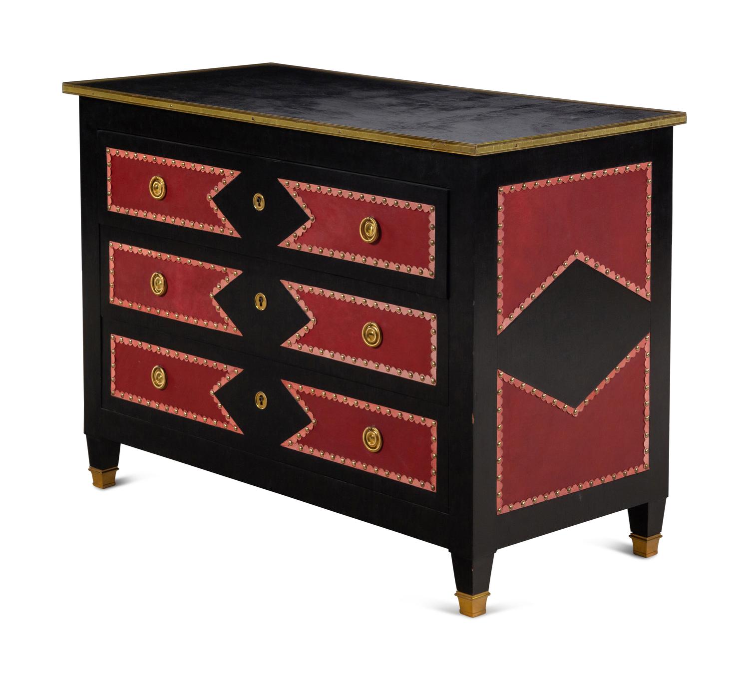 A Black Painted Red Leather-Inset Chest of Drawers