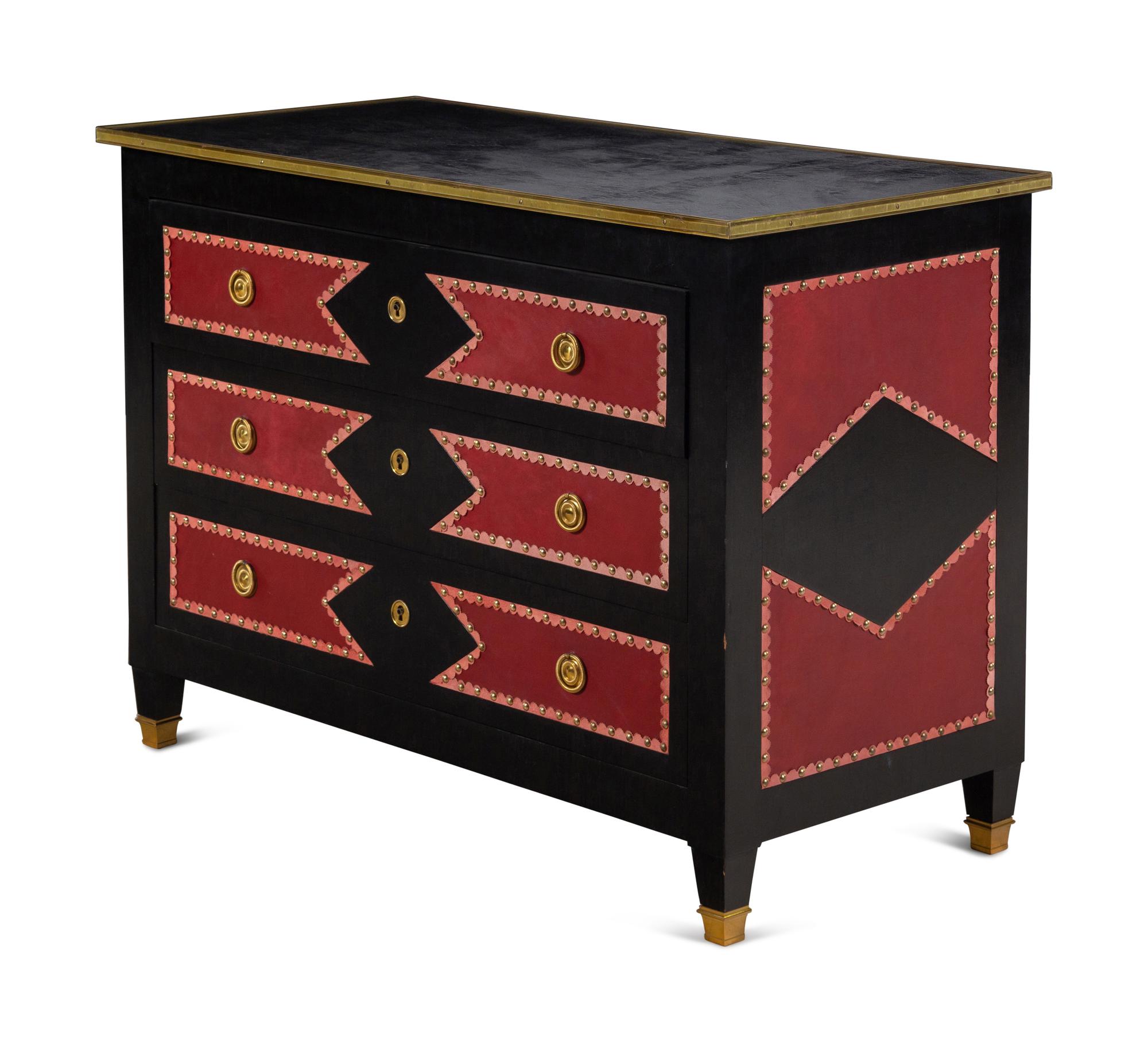 A Black Painted Red Leather-Inset Chest of Drawers