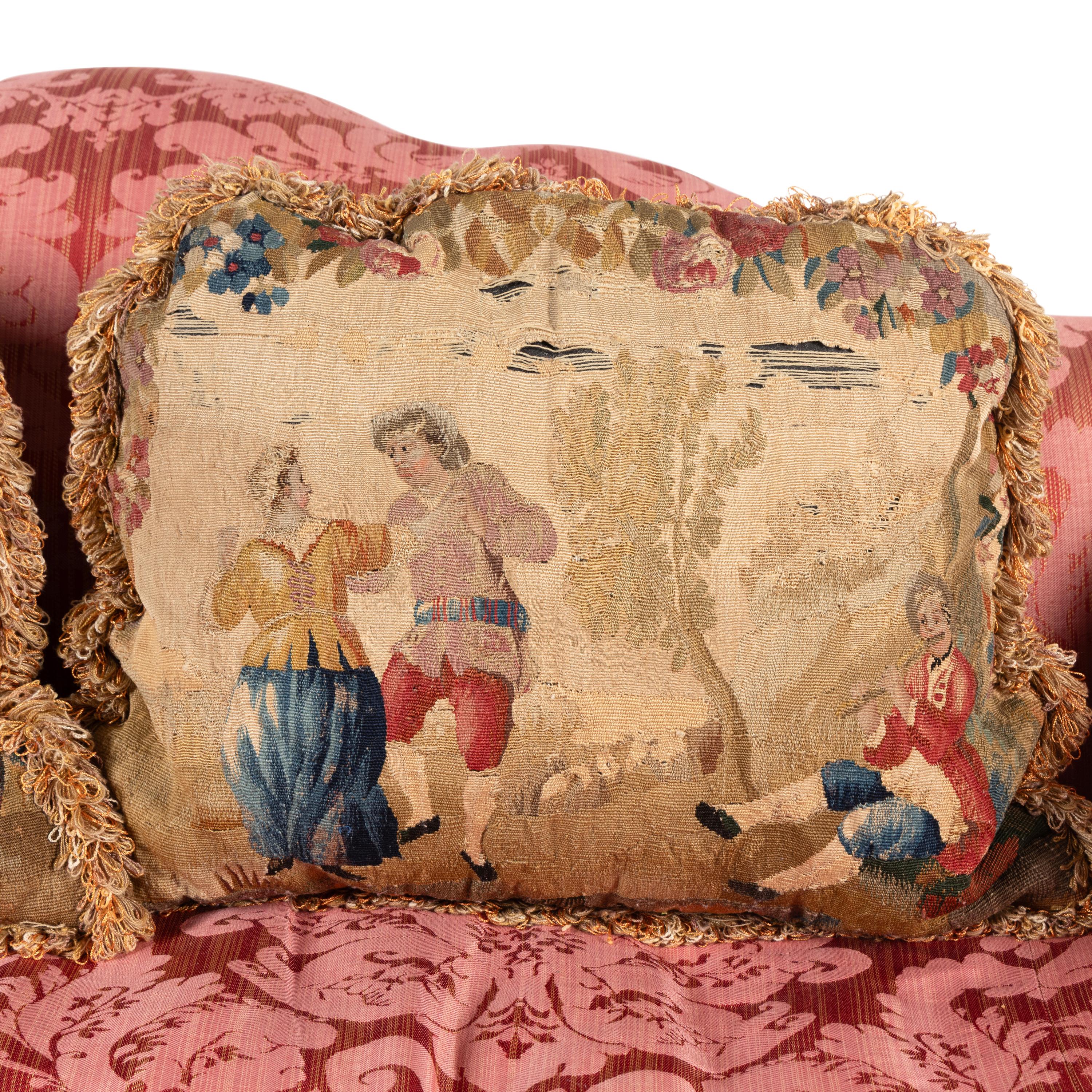 A George III Style Mahogany Camelback Settee
