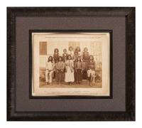 CHOATE, John N. (1848-1902), photographer. A pair of large format photographs featuring identified Chiricahua Apache students at Carlisle Indian School, before and after. Carlisle, PA, ca 1880s.
