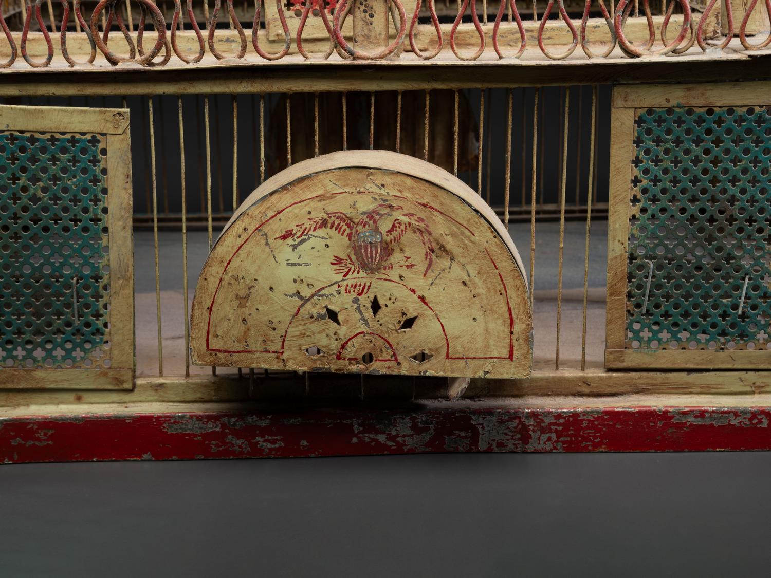 A Painted Sheet Metal and Wire Steamboat Form Birdcage