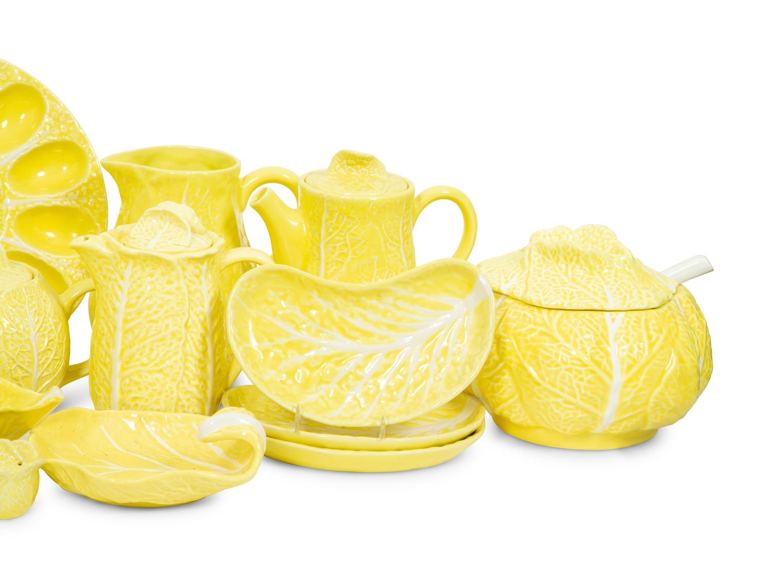An Extensive Portuguese Yellow Ceramic Lettuce Ware Dinner Service