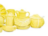 An Extensive Portuguese Yellow Ceramic Lettuce Ware Dinner Service