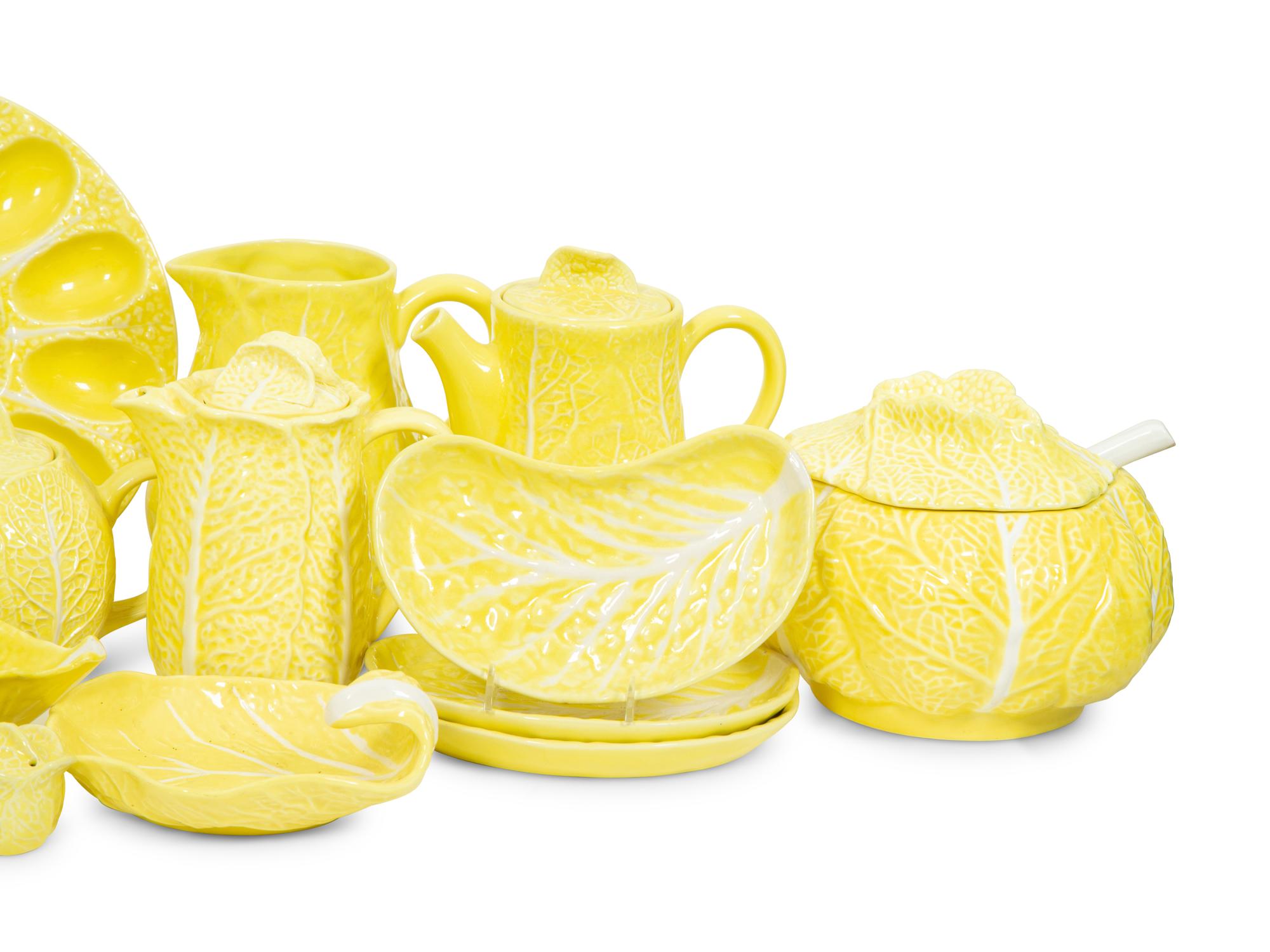 An Extensive Portuguese Yellow Ceramic Lettuce Ware Dinner Service
