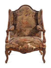 A Louis XV Style Walnut Tapestry-Upholstered Bergère