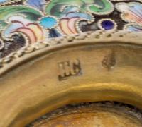 A Russian Enameled Silver-Gilt Kovsh, Maker's mark HC, having a shaped handle, the interior worked with polychrome flowers and scrolls