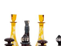 Eight Colored Glass Decanters and a Silver-Plate Galleried Serving Tray