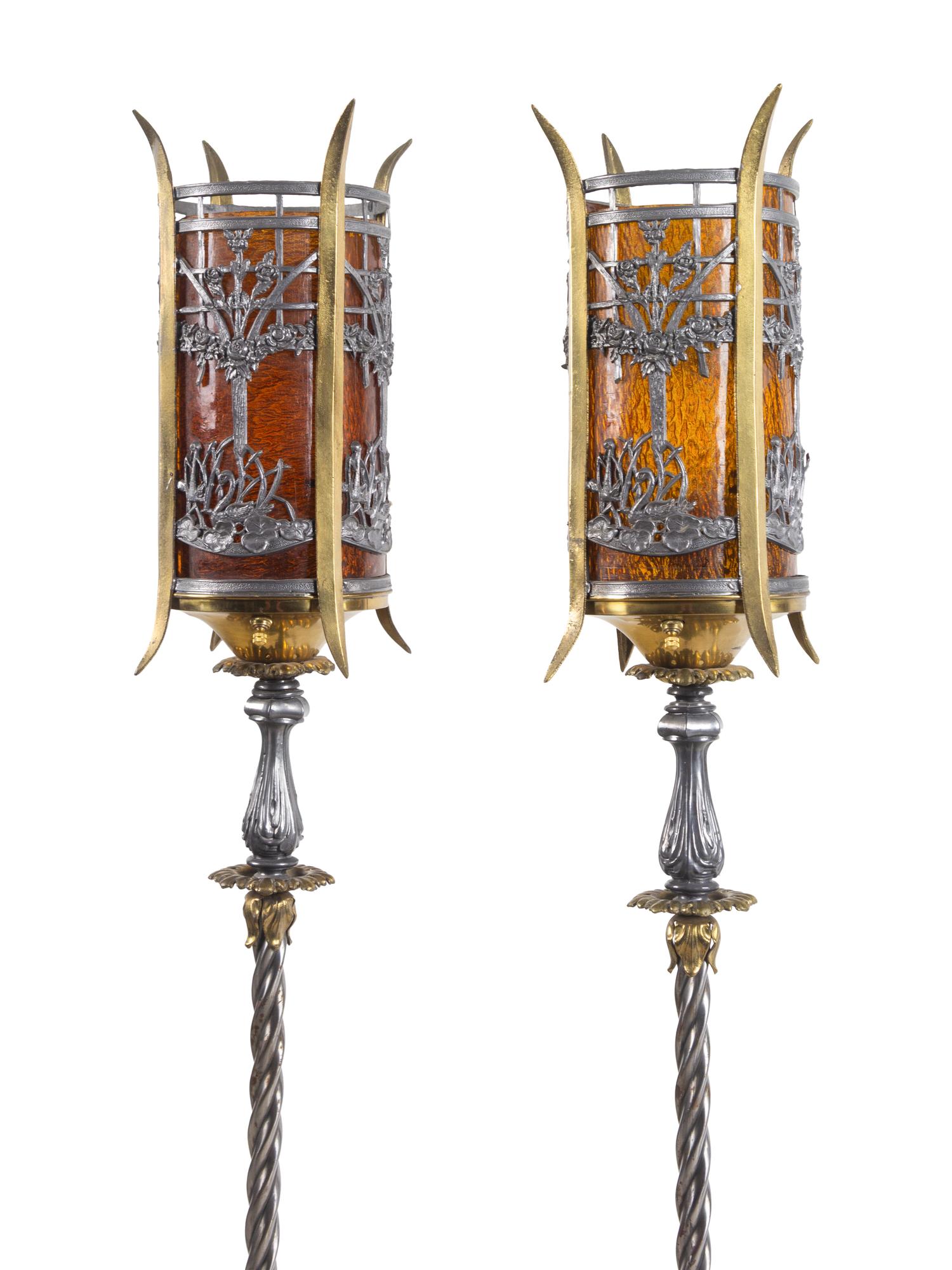A Pair of Iron and Brass Floor Lamps