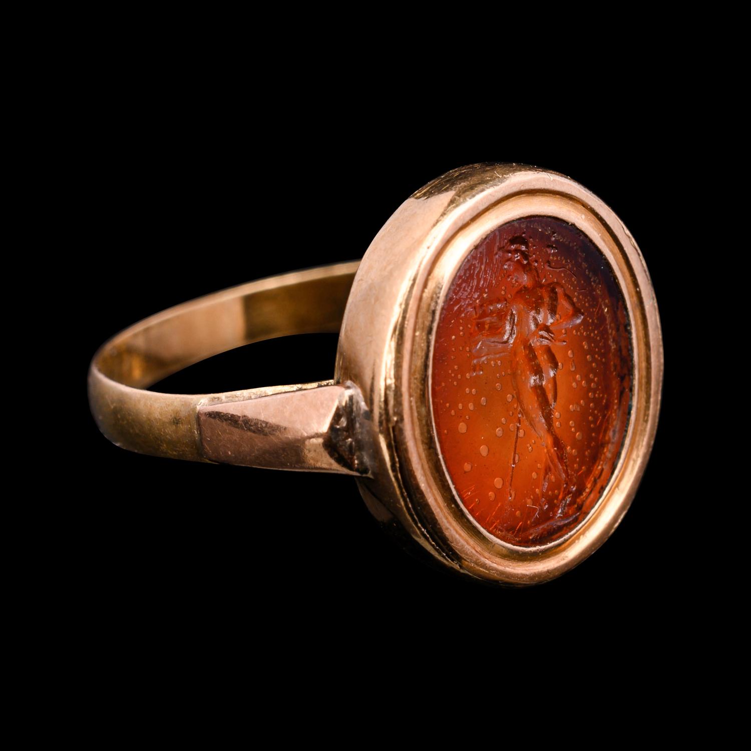A Roman Glass Intaglio Ring with Pan