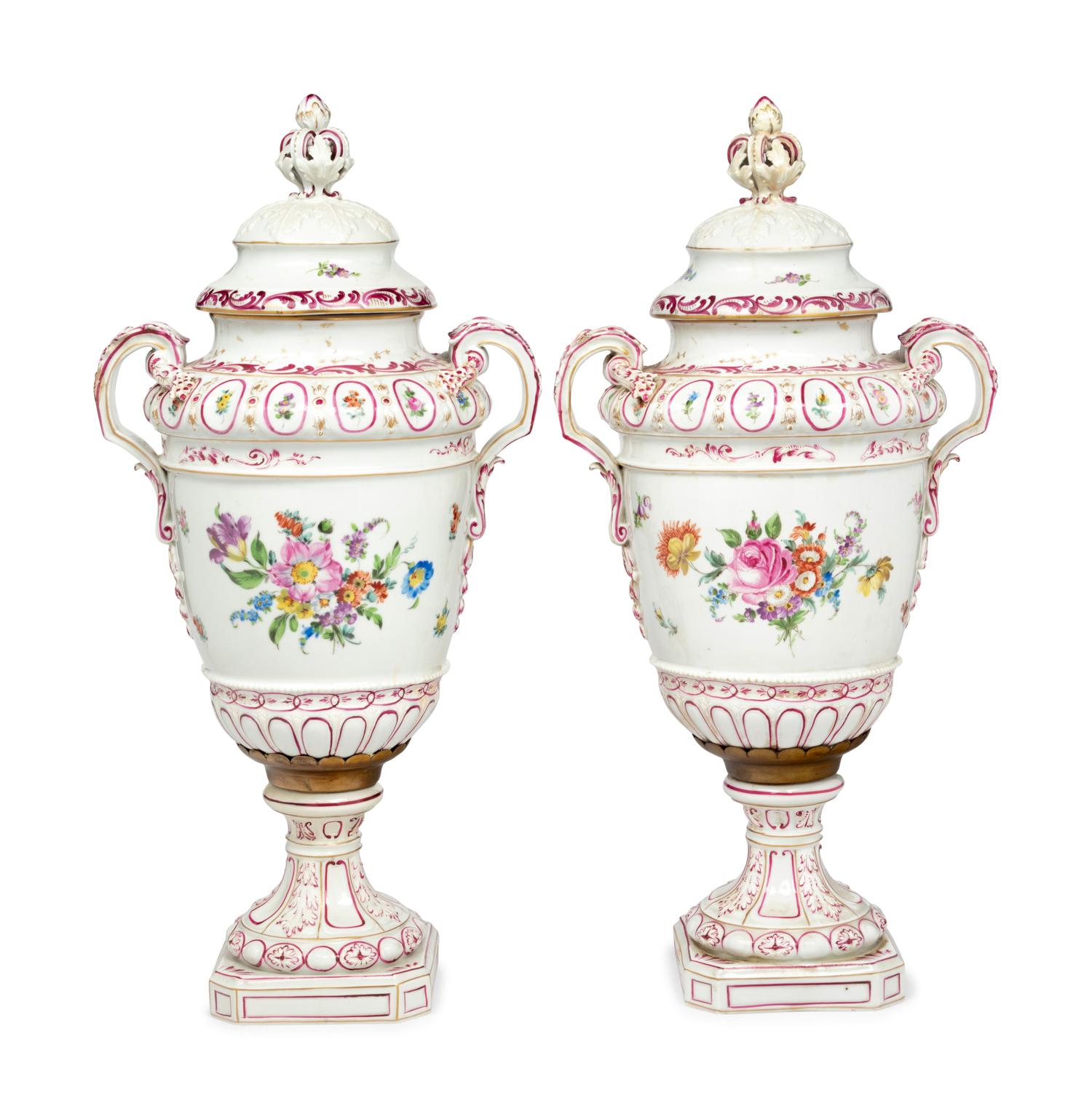 A Pair of Continental Porcelain Urns
