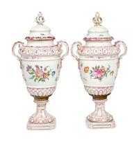 A Pair of Continental Porcelain Urns