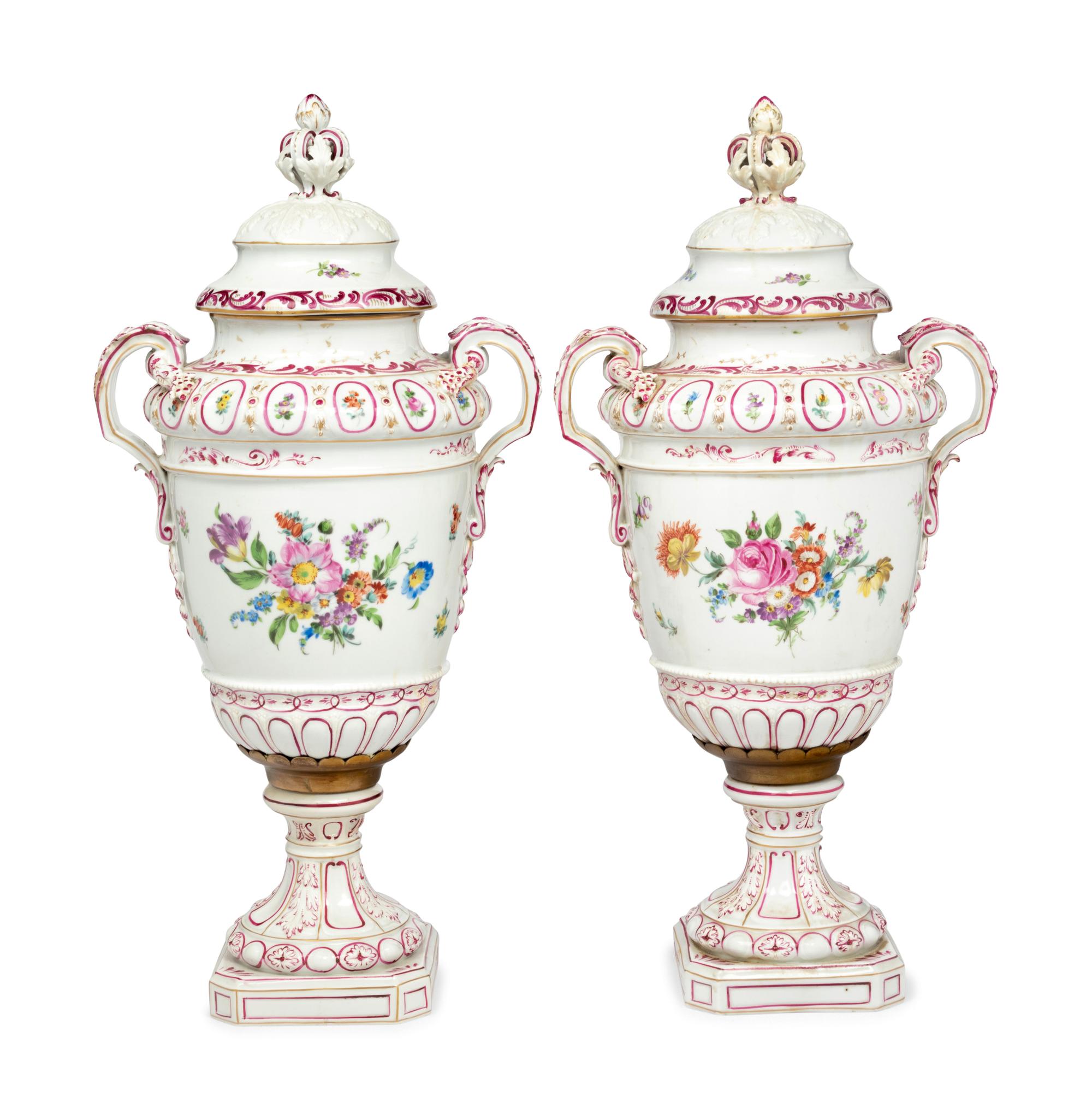 A Pair of Continental Porcelain Urns