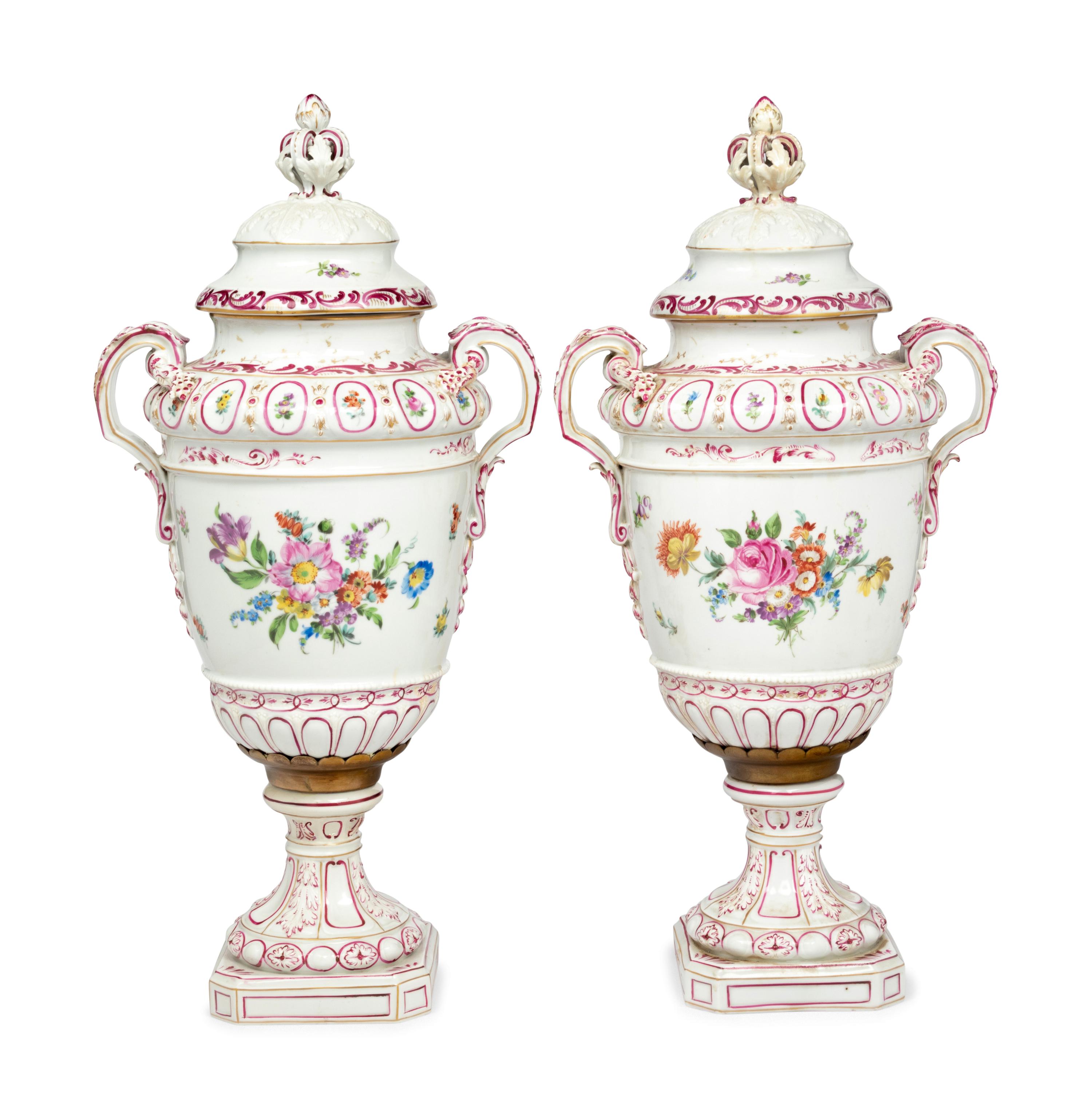 A Pair of Continental Porcelain Urns
