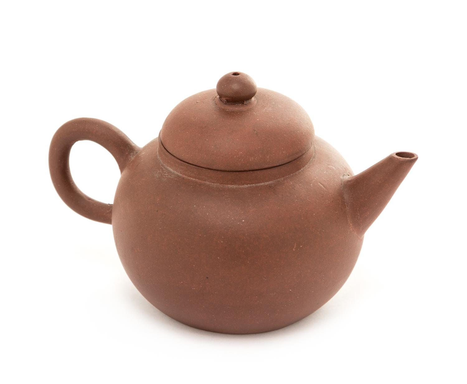 A Yixing Pottery Teapot Height 3 inches.