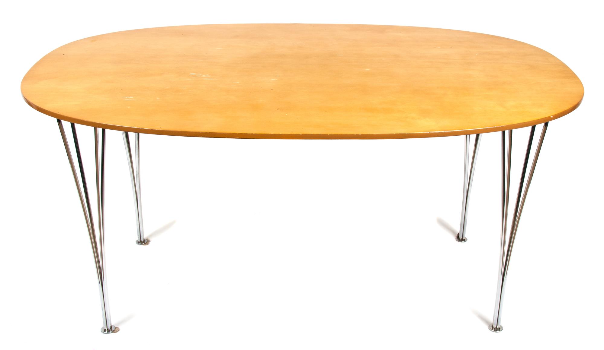 A Danish Modern Oval Top Dining Table Height 28 x width 40 x depth 57 inches.