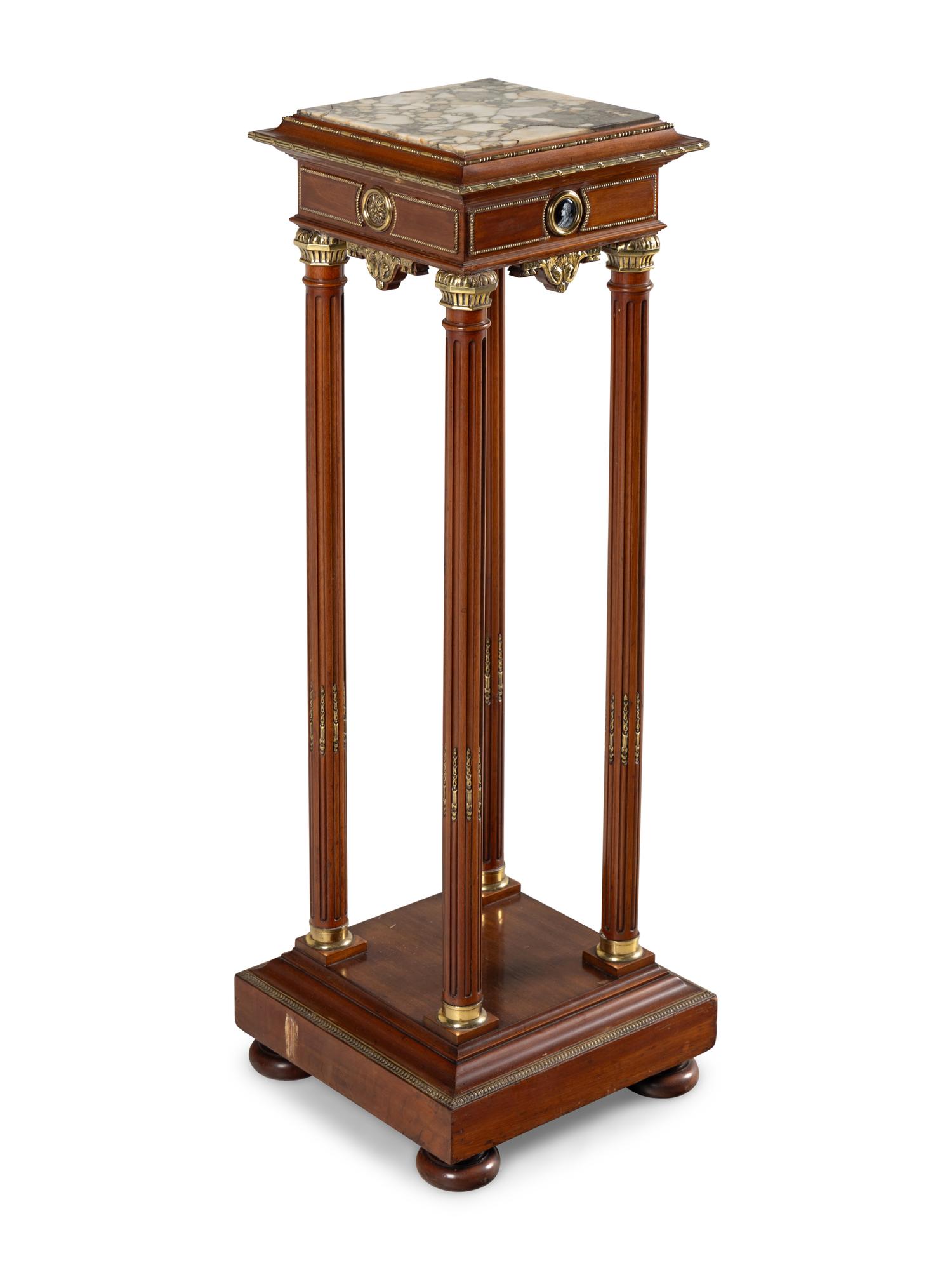 A Continental Gilt Bronze and Enamel Medallion Mounted Mahogany Marble-Top Pedestal