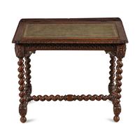 An Italian Carved Oak Writing Desk