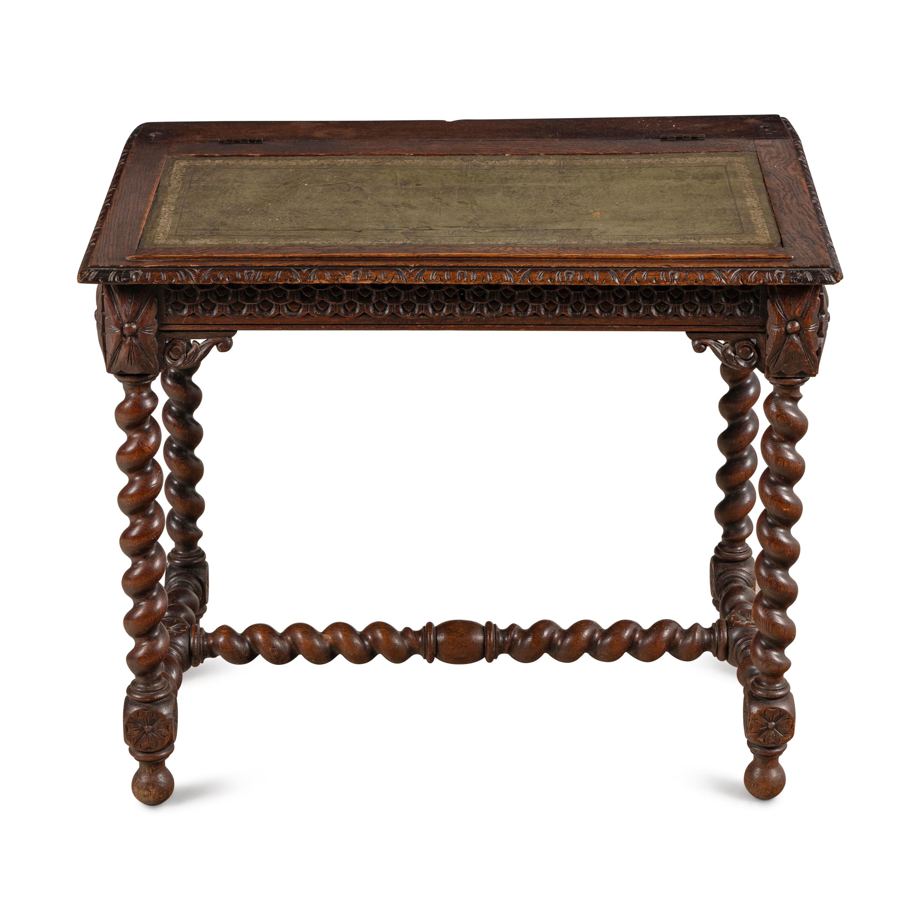 An Italian Carved Oak Writing Desk